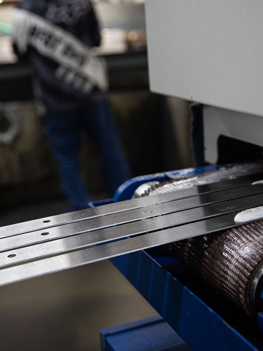 Finished blades coming off the timesaver finishing machine